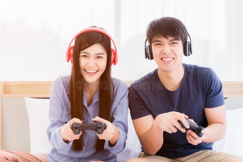 Couple playing games stock image. Image of girlfriend - 132760653