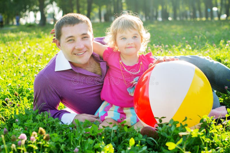 Happy young father and daughter