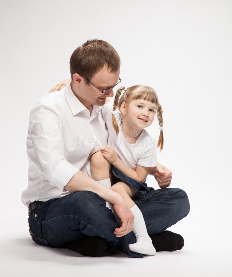 Happy young father with his smiling daughter royalty free stock image Happy young father with his smiling daughter royalty free stock image