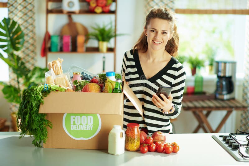 Happy Young Female with Food Box in Kitchen Stock Photo Image of
