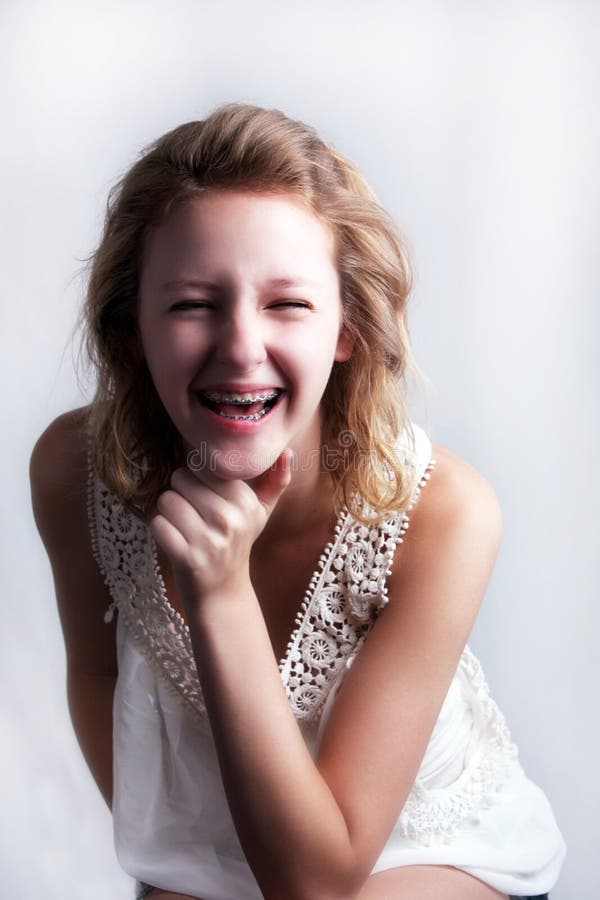 Happy young girl with braces