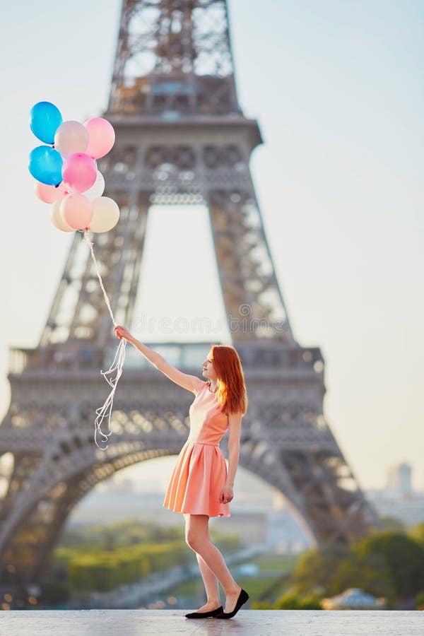 Girl with Bunch of Balloons in Front of the Eiffel Tower in Paris Stock ...