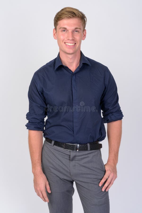 Studio shot of young handsome businessman with blond hair against white background. Studio shot of young handsome businessman with blond hair against white background