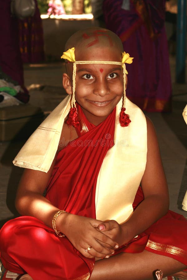 Happy young Indian monk