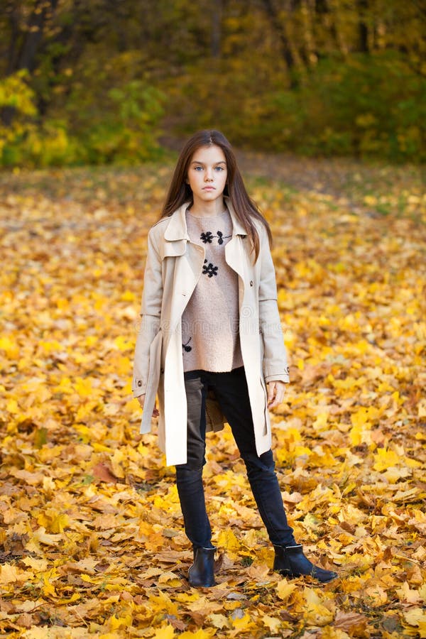 Happy Young Little Girl in Beige Coat Stock Image - Image of autumn ...