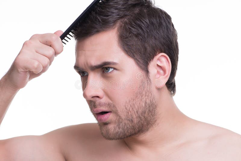 Happy Young Man Combing Hair. Stock Photo Image of beauty, male 38291074