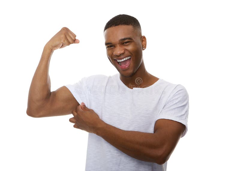 Close up portrait of a happy young man flexing bicep muscle