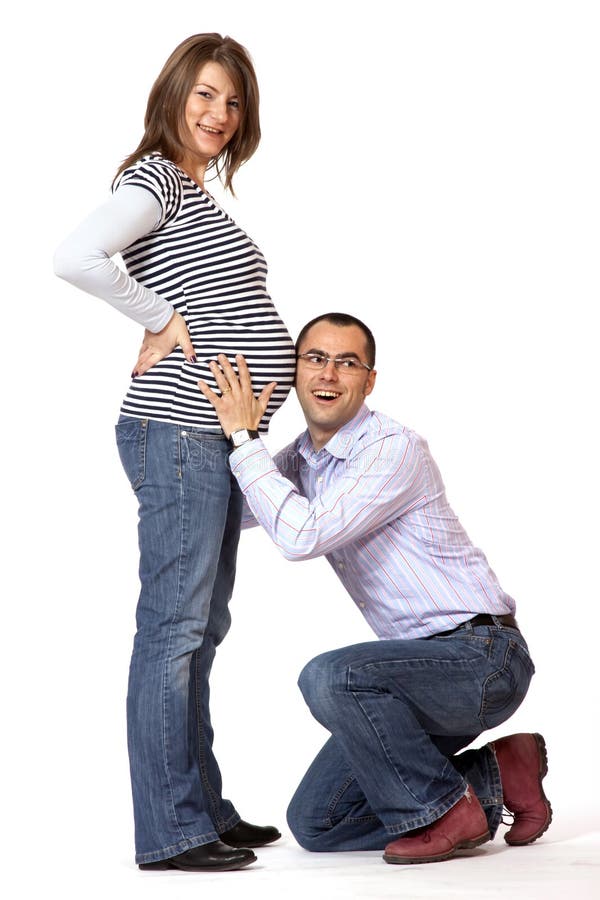 Happy young man and his pregnant wife