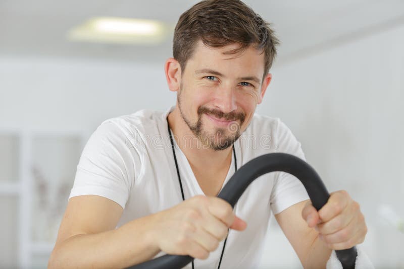 Happy young man after spinning class royalty free stock image Happy young man after spinning class royalty free stock image