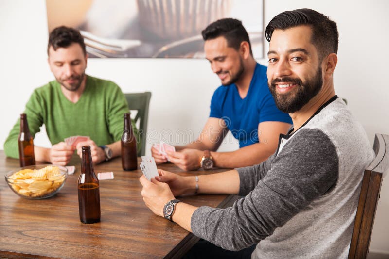 Happy Young Men Playing Cards at Home Stock Image - Image of handsome ...