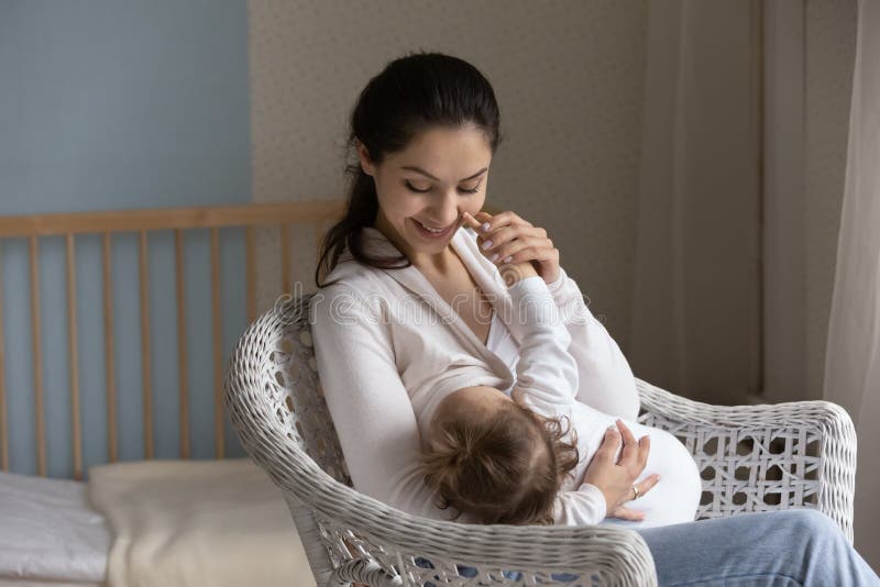 https://thumbs.dreamstime.com/b/happy-young-mom-enjoying-breastfeeding-baby-motherhood-emotional-bonding-happy-young-mom-enjoying-breastfeeding-baby-motherhood-229599448.jpg
