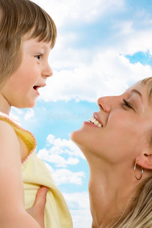 Happy young mother with her daughter royalty free stock photos