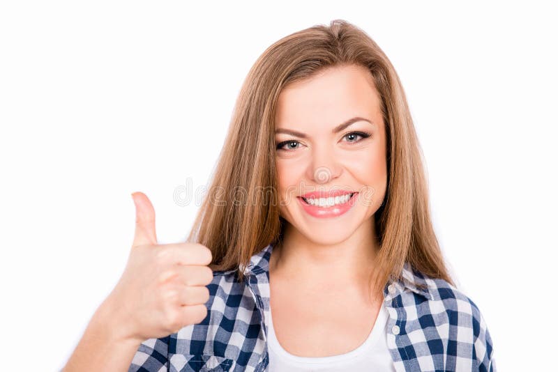 Happy Young Smiling Girl Gesturing and Showing Thumb Up Stock Image ...