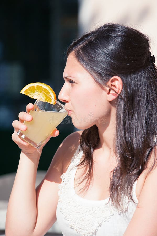 Happy Young Woman Drinking stock photo. Image of adult 26517836
