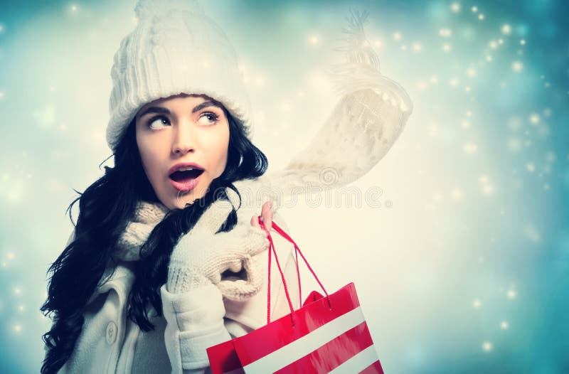 Happy Young Woman Holding a Shopping Bag Stock Photo - Image of ...