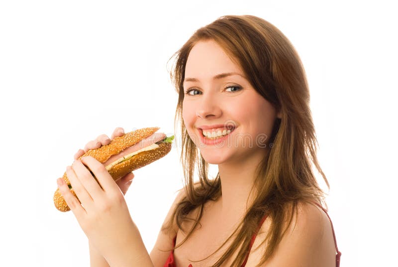 Happy young woman with a hot-dog