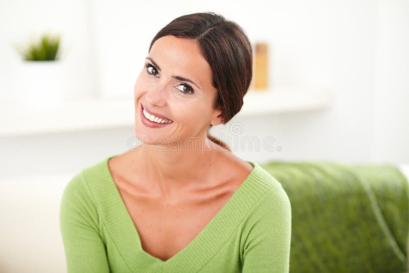 Happy young woman looking at the camera stock images Happy young woman looking at the camera stock images