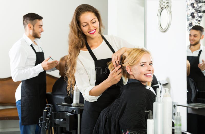 Happy Hairdresser Doing Hairstyle Stock Photo - Image of trim, people ...