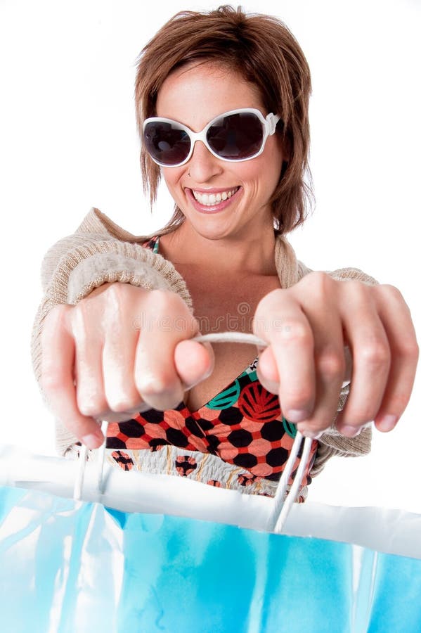 Happy young woman with shopping bags