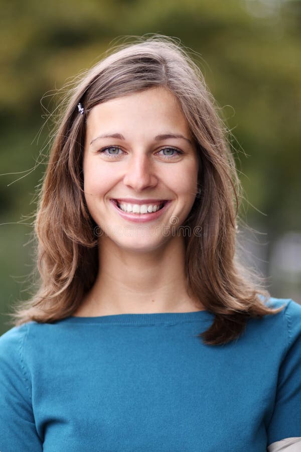 Happy young woman smiling