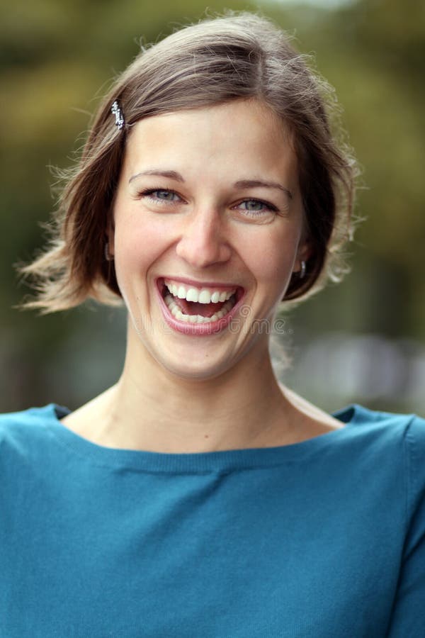 Happy young woman smiling