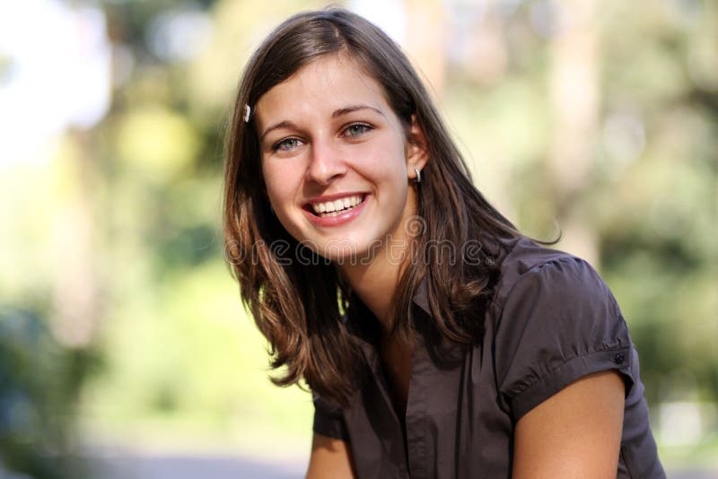 Happy young woman smiling