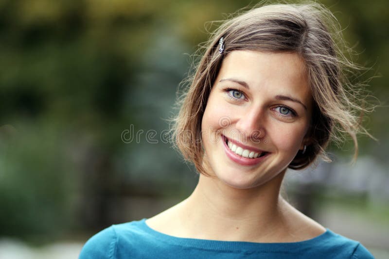 Happy young woman smiling