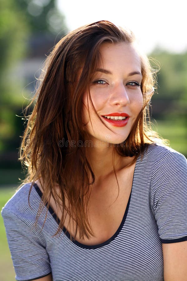 Happy young woman smiling