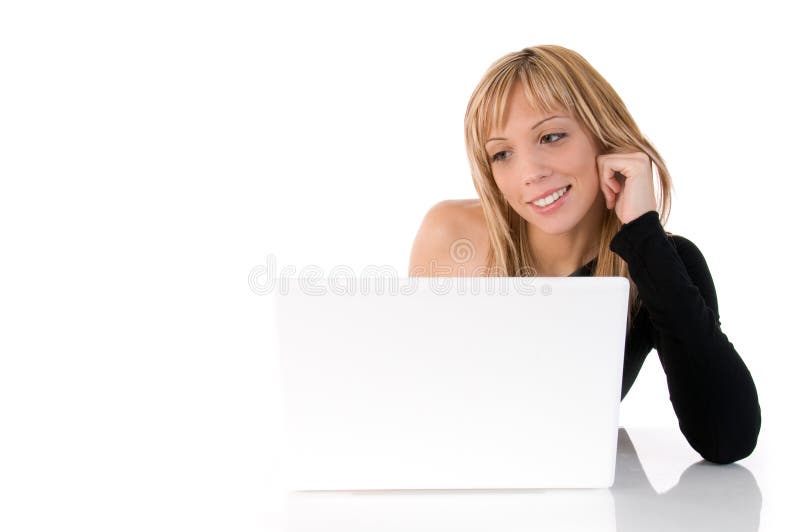 Happy young woman using laptop