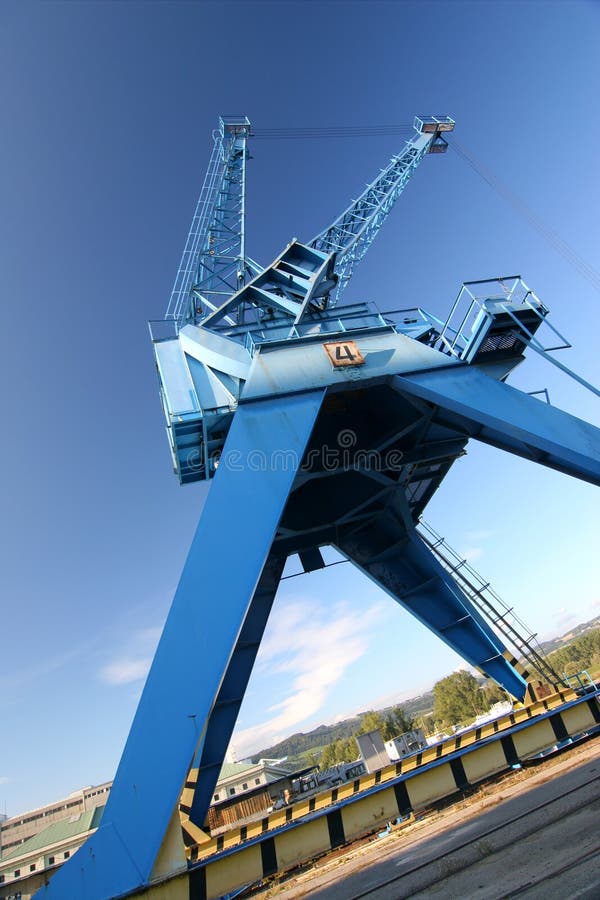 Harbor crane in blue sky