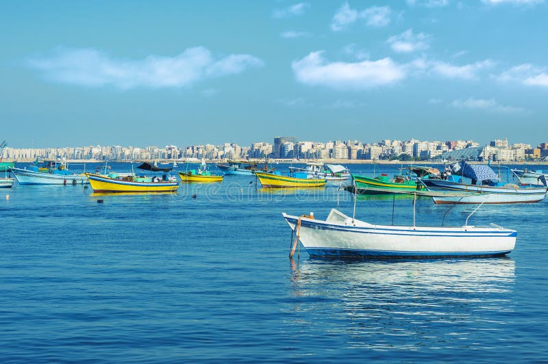 Harbor of Fishing Boats Floating on Blue Sea Water