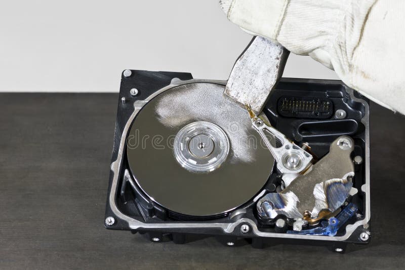 Hard disk and chisel royalty free stock photo