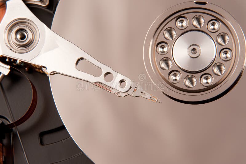 Opened hard disk drive - computer technology. Harddisk computer part data disk stock images, royalty-free photos and pictures