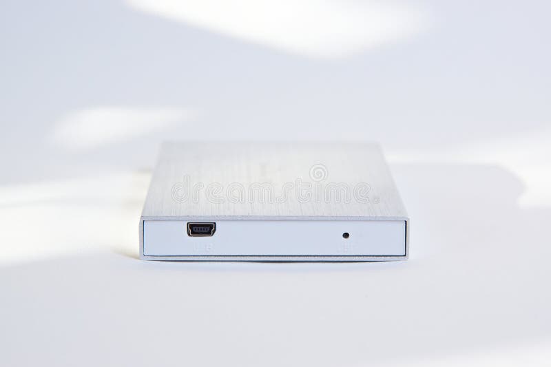 External hard drive with usb connector on white background royalty free stock photography