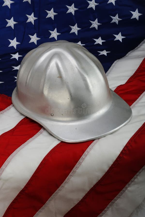 Hard Hat on American Flag stock image. Image of metaphor 17644929