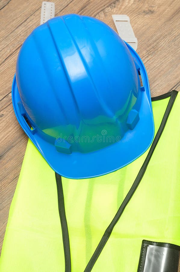 A Hard Hat Displayed On A Safety Vest Stock Photo Image of labour