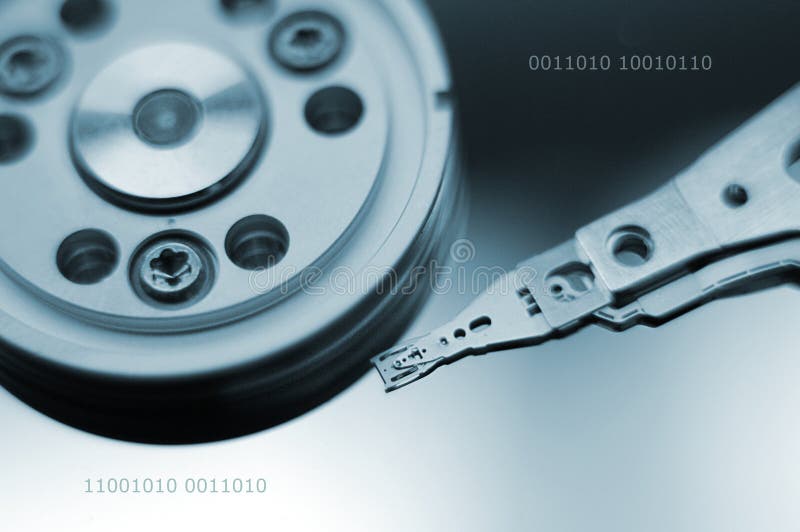 The insides of a harddisk with0011010 text added