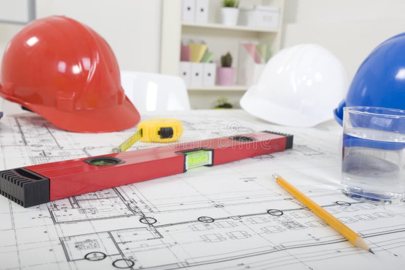 Hardhat and measuring instruments royalty free stock photo