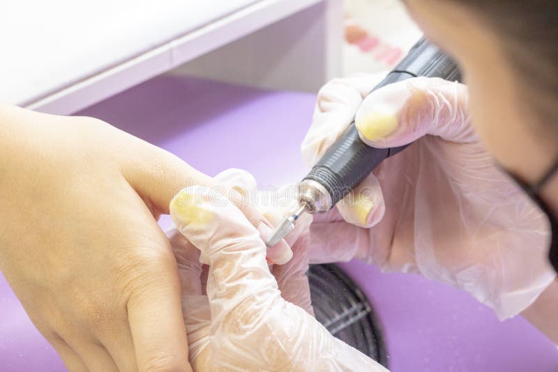 Hardware Manicure. Gellak Removal Shellac Coating Nail Plate Treatment