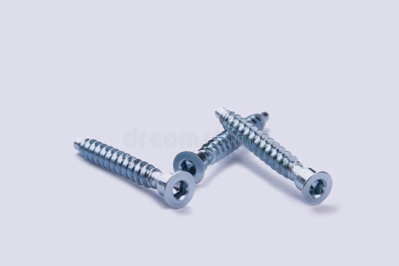 Hardware Screws Nails For Construction On A White Background. Stock