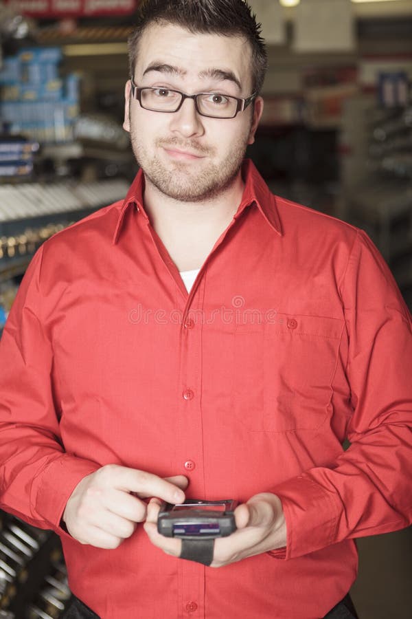 Hardware store employee stock image. Image of retail 50822523