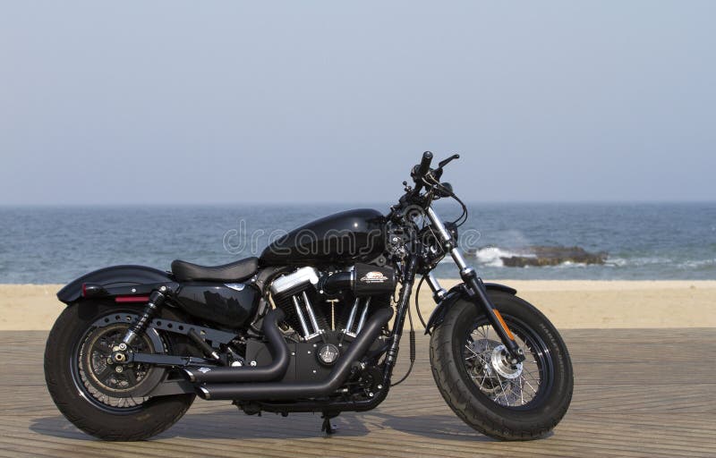 Custom made Harley Davidson on a beach deck. Custom made Harley Davidson on a beach deck