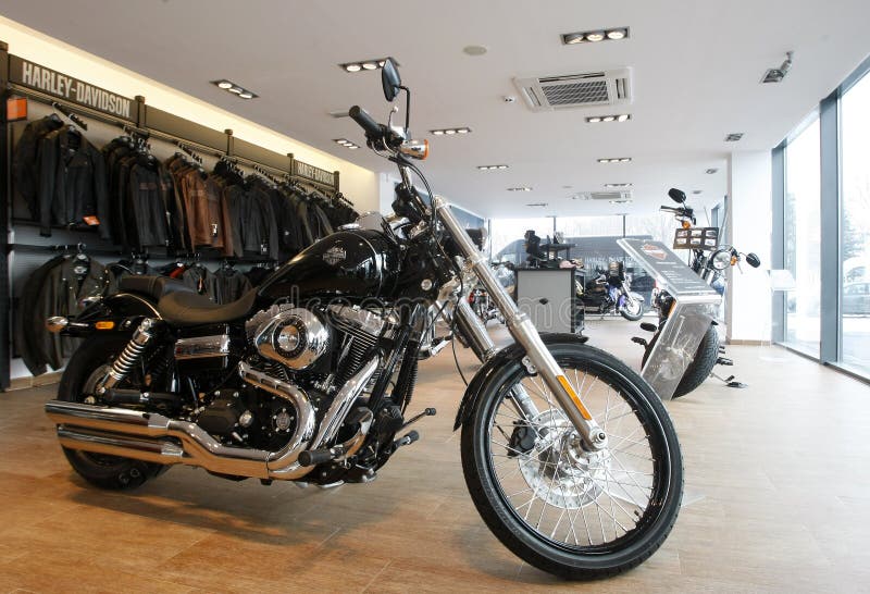 Harley Davidson motorcycles are displayed in a new Harley show room. Harley Davidson motorcycles are displayed in a new Harley show room