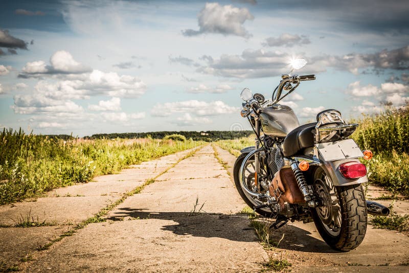 RUSSIA-JULY 7, 2013: Harley-Davidson Sportster 883 Low. Harley-Davidson sustains a large brand community which keeps active through clubs, events, and a museum. Filter applied in post-production. RUSSIA-JULY 7, 2013: Harley-Davidson Sportster 883 Low. Harley-Davidson sustains a large brand community which keeps active through clubs, events, and a museum. Filter applied in post-production.