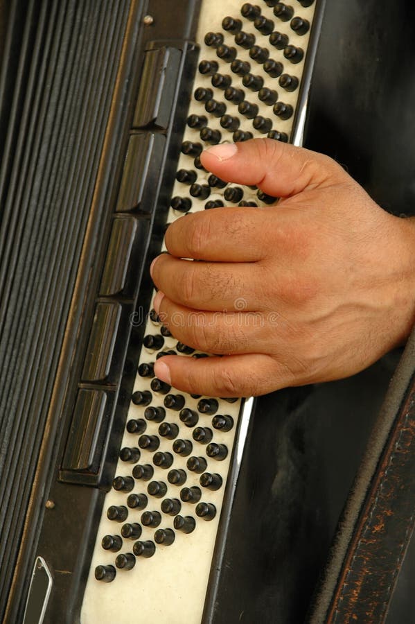 A man playing his harmonica