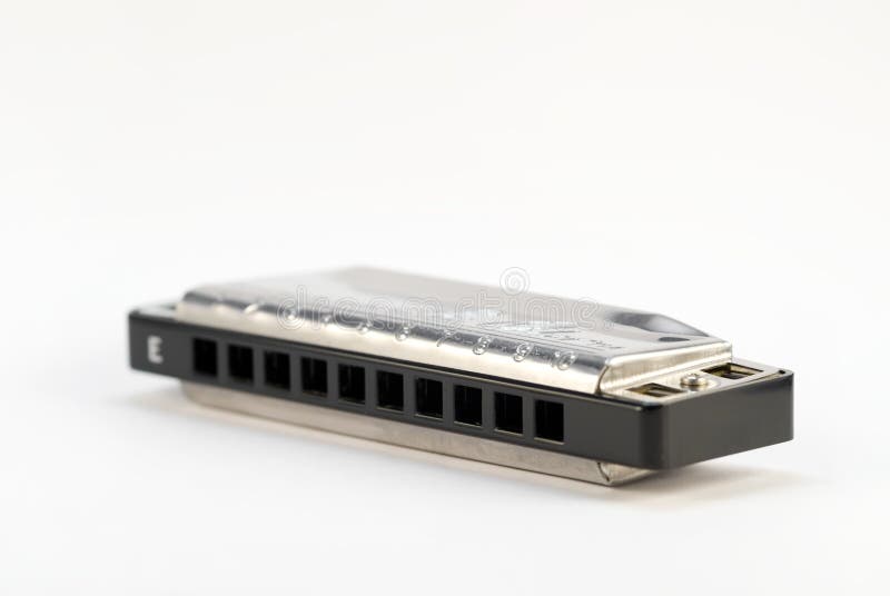 Harmonica on a white background