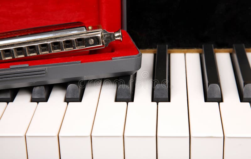 Harmonica and piano stock photo. Image of artistic, black 37031950