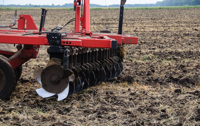 The Harrow Disc. Agricultural Equipment. Stock Photo Image of dust