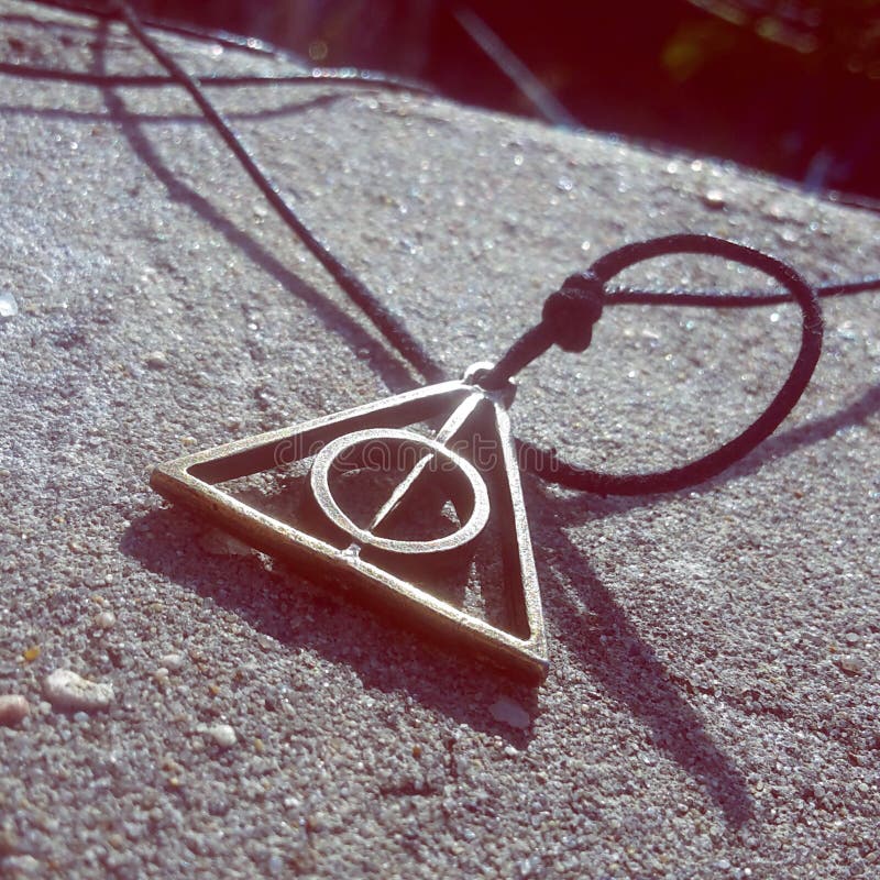 Harry Potter Deathly Hallows Necklace | Accio Wrapping Paper! These Are  2019's Best Gifts For Harry Potter Fans | POPSUGAR Entertainment UK Photo 52