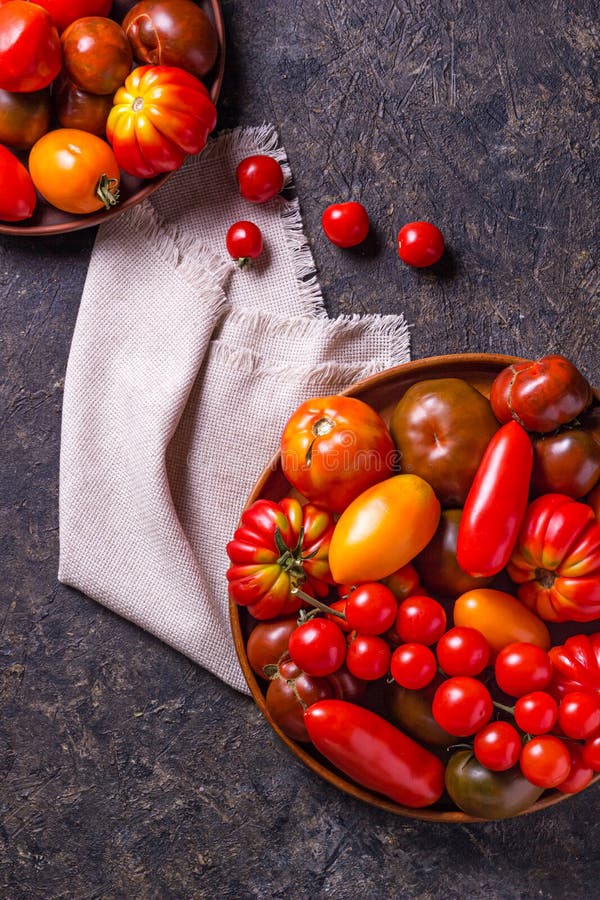 The Harvest of Assorted Tomatoes. Colorful Organic Tomatoes on a Large